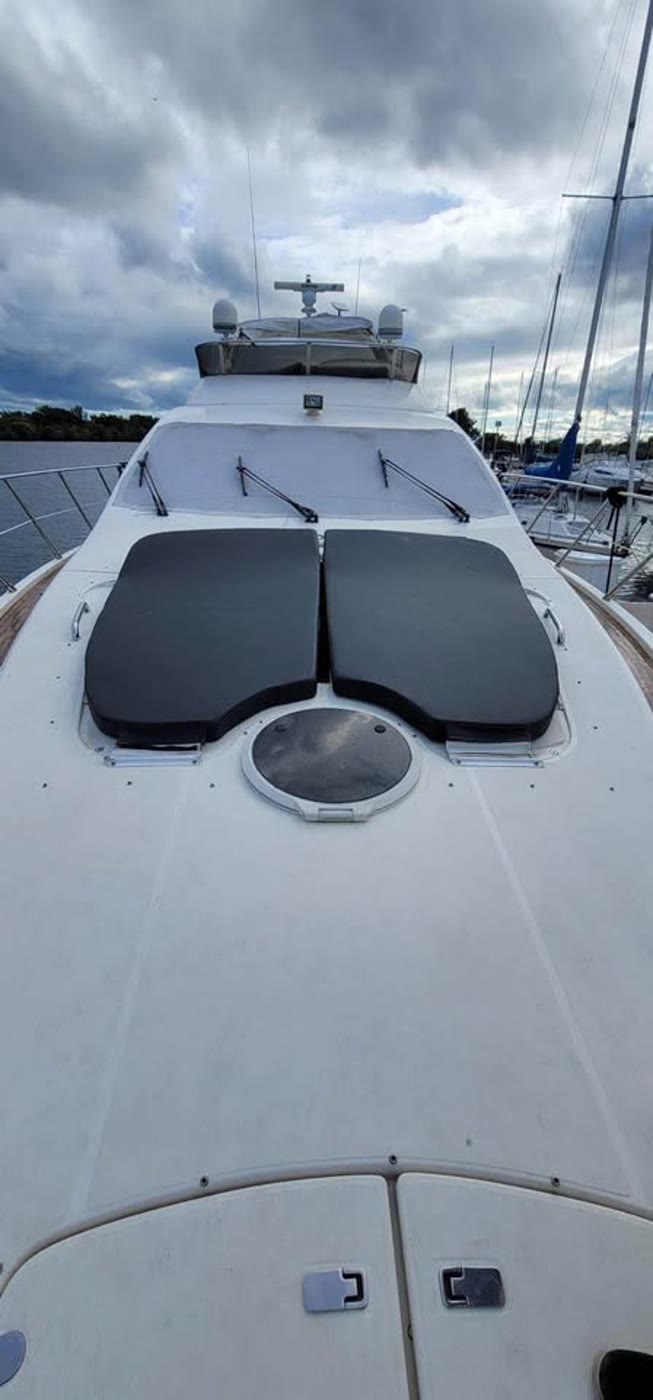 Custom boat bow sunpad cushions on deck